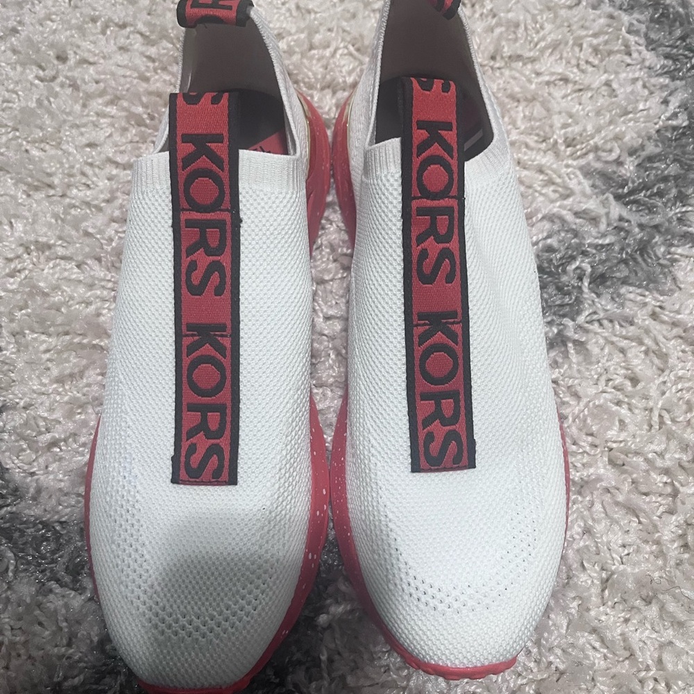 Micheal Kors sneakers. Never worn.